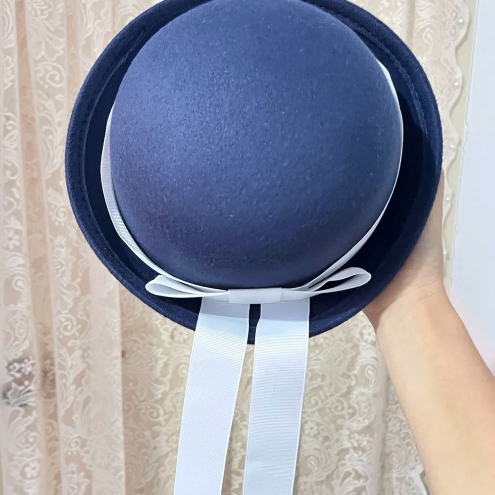 Elegant Blue Hat with White Ribbon